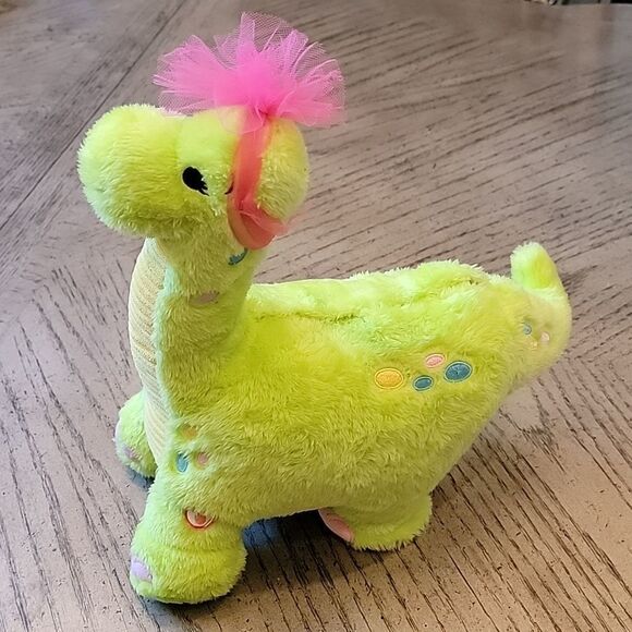 Hallmark egg laying dino with motion and song - Picture 1 of 6